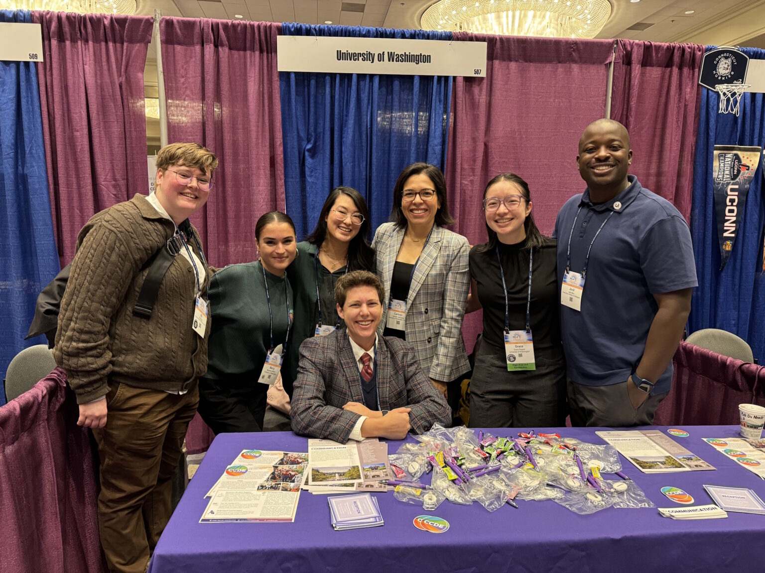CCDE members at a conference exhibit table